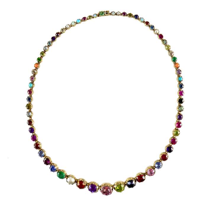 Early 19th century graduated vari-coloured gem set collet necklace, c.1830, including emeralds, rubies, sapphires, garnets, pearls and other gemstones,